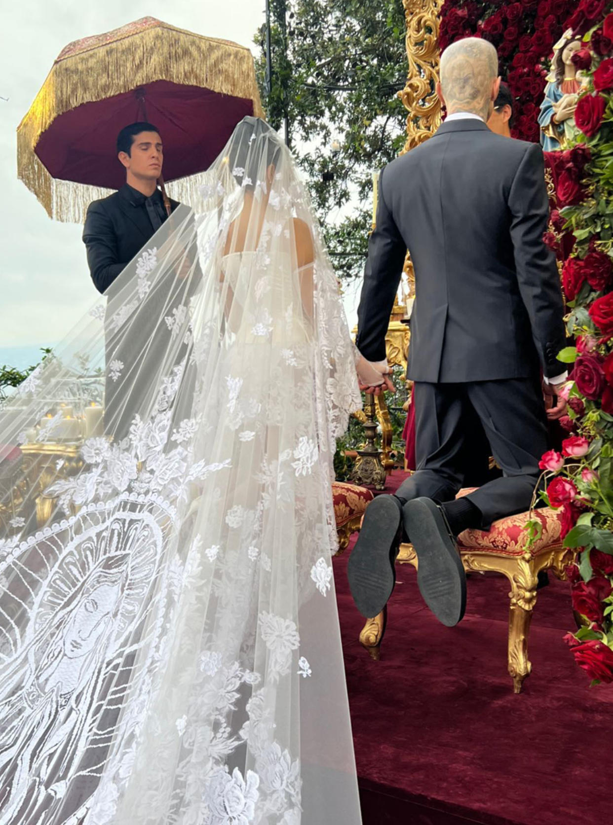 The couple during their Italian wedding ceremony. (alabamaluellabarker / Instagram)