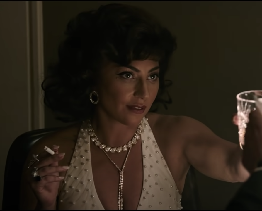 <p>In the movie, Patrizia is played by Lady Gaga who absolutely nails her look and voice and, TBH, might look even more glamorous than the real-life socialite did. </p>