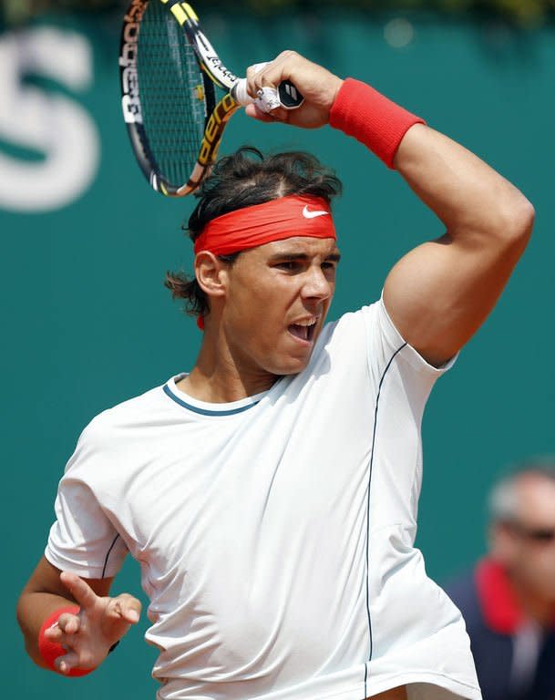 Spain's Rafael Nadal hits a return to Australia's Marinko Matosevic on April 17, 2013 during the Monte-Carlo ATP Masters Series Tournament tennis match in Monaco. Nadal won 6-1, 6-2