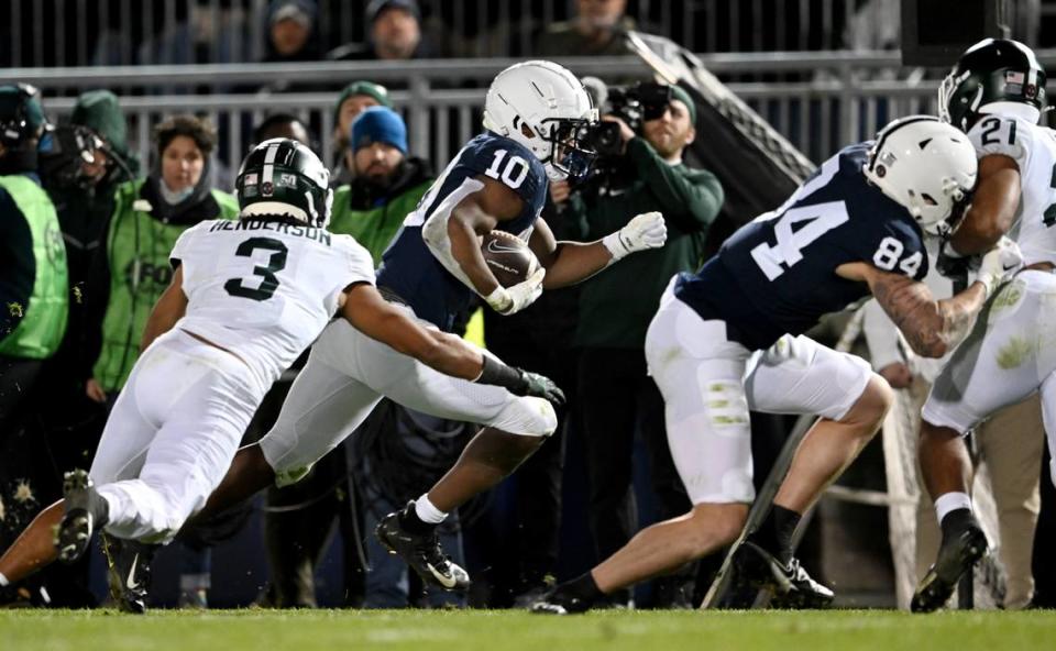 Michigan State defenders can’t stop Penn State running back Nick Singleton as he goes for a touchdown during the game on Saturday, Nov. 26, 2022.