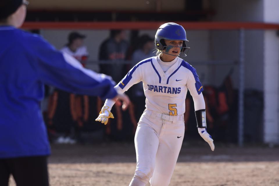 Imlay City's Jaya Forti runs to first base during a game earlier this season. She scored the Spartans' lone run in their 7-1 loss to Detroit Country Day in a Division 2 regional semifinal on Saturday.