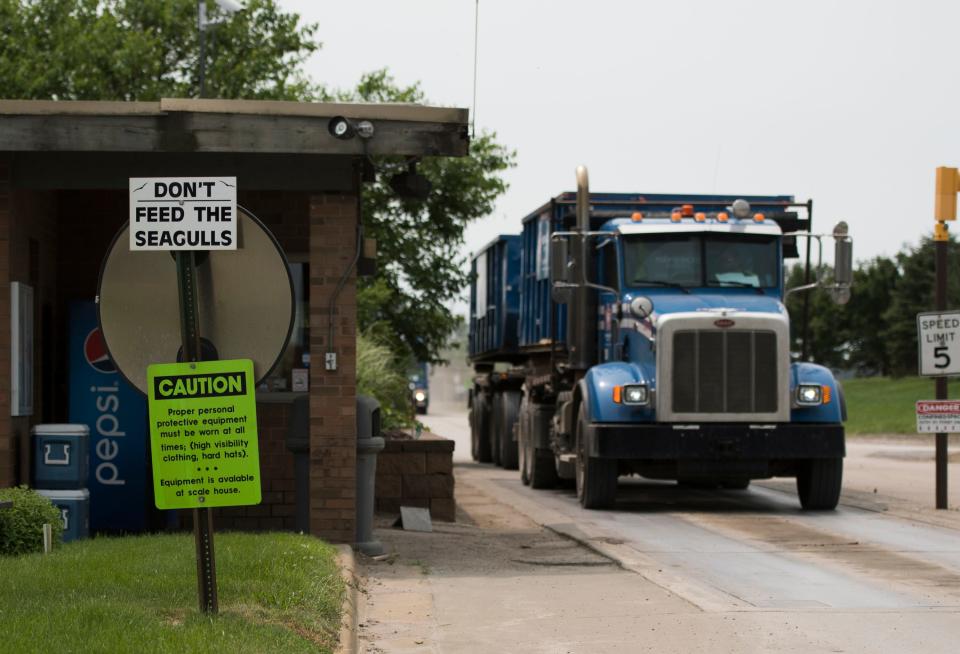 A garbage truck leaves the Ottawa County Farms Landfill in Coopersville, Michigan, Monday, July 8, 2019. [Matthew Dae Smith/Lansing State Journal]