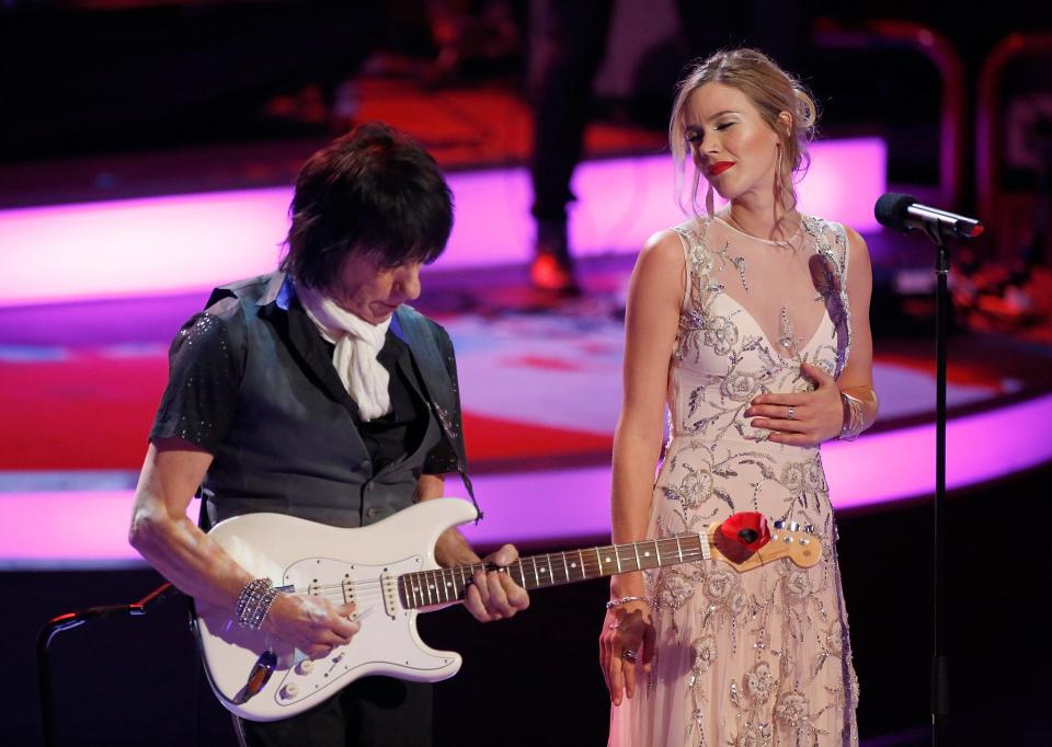 Jeff Beck and Joss Stone perform on stage during The Royal British Legion's Festival of Remembrance matinee performance at Royal Albert Hall on November 8, 2014 in London, England. 