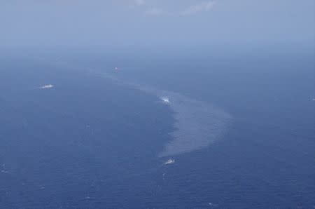 The oil spill from a stricken Iranian tanker Sanchi is seen in the East China Sea, on January 16, 2018 in this photo provided by Japan’s 10th Regional Coast Guard. 10th Regional Coast Guard Headquarters/Handout via REUTERS/Files