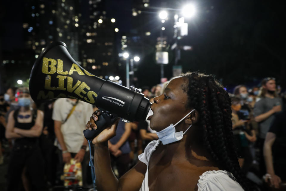 FILE - In this June 30, 2020, file photo, protesters gather at an encampment outside City Hall in New York. Thousands of Black activists from across the U.S. will hold the 2020 Black National Convention on Aug. 28, 2020, via livestream to produce a new political agenda that builds on the protests that followed George Floyd’s death. Organizers of the gathering shared their plans with The Associated Press on Wednesday, July 1, ahead of an official announcement. (AP Photo/John Minchillo, File)