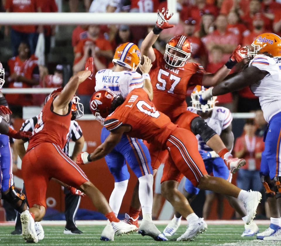 Utah Utes defensive end Logan Fano (0) sacks Florida Gators quarterback Graham Mertz (15) in Salt Lake City on Thursday, Aug. 31, 2023 during the season opener. Utah won 24-11. | Jeffrey D. Allred, Deseret News