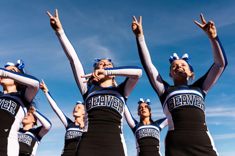 Beaver High School cheerleaders make their fingers into “v”’s for victory while celebrating their championship win against Enterprise High School for the 1A football state championship at Southern Utah University in Cedar City on Saturday, Nov. 11, 2023. | Megan Nielsen, Deseret News