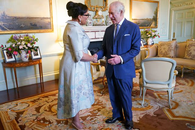 <p>YUI MOK/POOL/AFP via Getty Images</p> Baroness Scotland of Asthal, the Commonwealth Secretary General, and King Charles meet at Buckingham Palace in London on March 13, 2024.