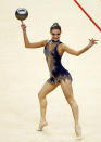 LONDON, ENGLAND - JANUARY 18: Chrystalleni Trikomiti of Cyprus in action in the Individual All-Around during the FIG Rhythmic Gymnastics Olympic Qualification round at North Greenwich Arena on January 18, 2012 in London, England. (Photo by Paul Gilham/Getty Images)