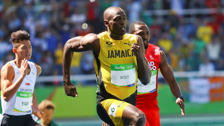 2016 Rio Olympics - Athletics - Preliminary - Men's 100m Round 1 - Olympic Stadium - Rio de Janeiro, Brazil - 13/08/2016. Usain Bolt (JAM) of Jamaica competes. REUTERS/Leonhard Foeger