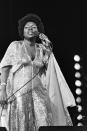 <p>One of the most popular disco divas of the '70s was Gloria Gaynor. Here, the songstress wears a silver sequin jumpsuit and cape, while delivering a command performance in California. </p>