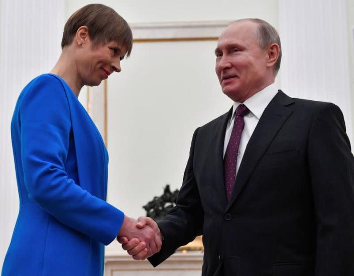 FILE PHOTO: Russian President Vladimir Putin meets with his Estonian counterpart Kersti Kaljulaid at the Kremlin in Moscow