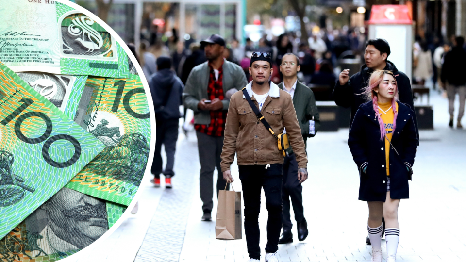 Australian money notes/cash. People walking in Sydney NSW. 