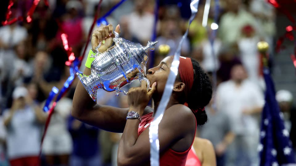 Gauff kisses the trophy after claiming victory at Flushing Meadows. - Mike Segar/Reuters
