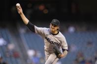 Miami Marlins starting pitcher Jordan Holloway throws a pitch against the Arizona Diamondbacks during the first inning of a baseball game Monday, May 10, 2021, in Phoenix. (AP Photo/Ross D. Franklin)