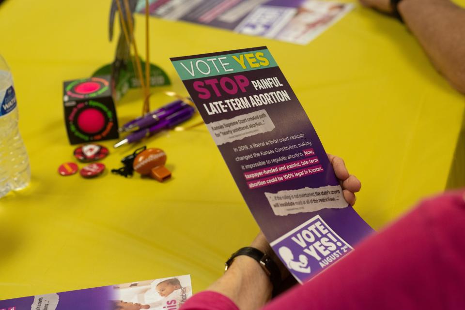 Anti-abortion pamphlets are seen on tables during a Value Them Both event in Topeka in June.