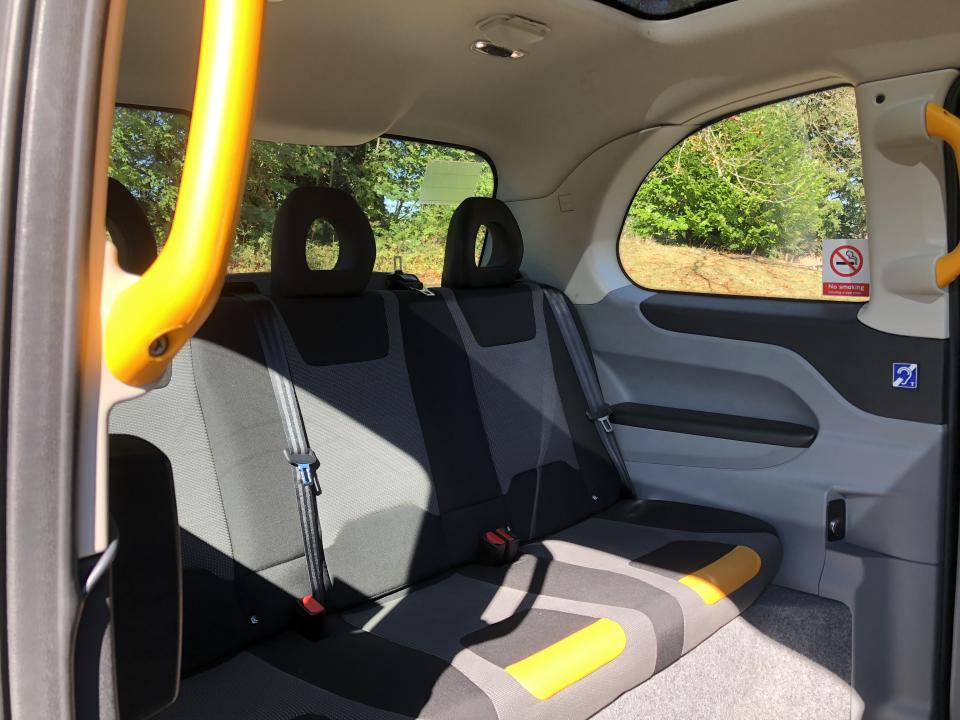 The back of the taxi can accommodate up to six passengers. The front area where the driver sits has space for two large suitcases. Photo: Alanna Petroff