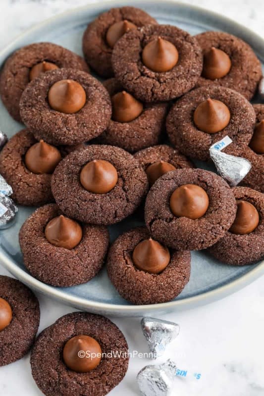 <p>Spend With Pennies</p><p>A chocolatey twist on a traditional thumbprint cookie.</p><p><strong>Get the recipe: <a href="https://www.spendwithpennies.com/hershey-kiss-cookies/" rel="nofollow noopener" target="_blank" data-ylk="slk:Hershey Kiss Cookies;elm:context_link;itc:0;sec:content-canvas" class="link ">Hershey Kiss Cookies</a></strong></p><p><strong>Related: <a href="https://www.yahoo.com/lifestyle/were-ranking-every-flavor-hershey-000400304.html" data-ylk="slk:20 Hershey's Kisses Flavors Ranked;elm:context_link;itc:0;sec:content-canvas;outcm:mb_qualified_link;_E:mb_qualified_link;ct:story;" class="link  yahoo-link">20 Hershey's Kisses Flavors Ranked</a></strong></p>