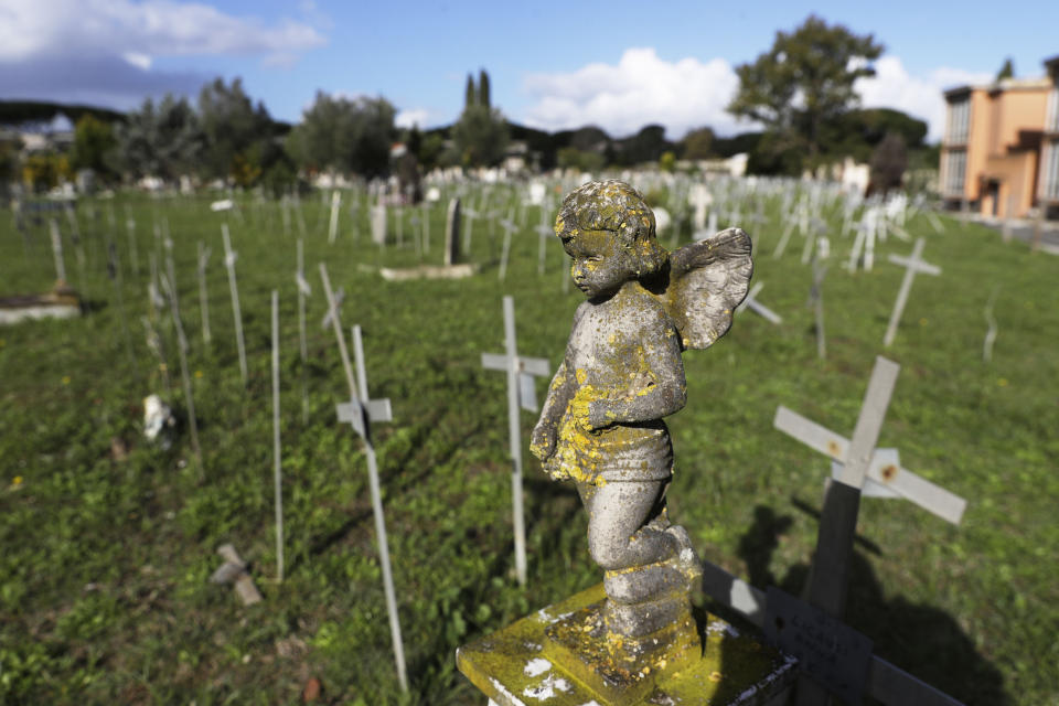 Crosses bearing tags with names are seen a graveyard of the Flaminio Cemetery, in Rome, Friday, Oct. 16, 2020. Italian prosecutors and the government’s privacy watchdog are investigating how the names of women who miscarried or had abortions ended up on crosses over graves for the fetuses in a Rome cemetery. (AP Photo/Gregorio Borgia)