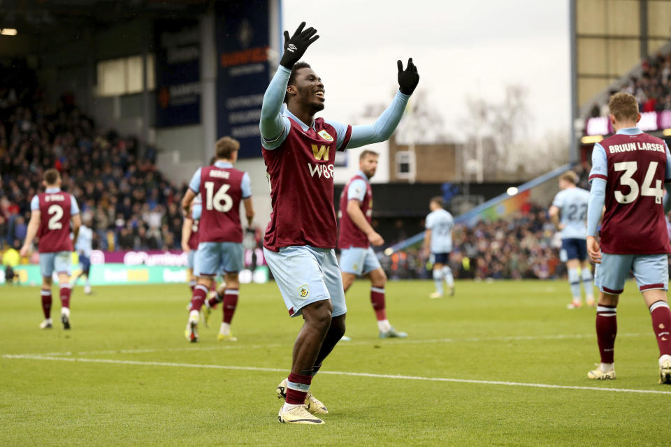 Burnley's David Datro Fofana, centre, celebrates after scoring his side's second goal of the game, during the English Premier League soccer match between Burnley and Brentford at Turf Moor, in Burnley, England, Saturday, March 16, 2024. (Barrington Coombs/PA via AP)