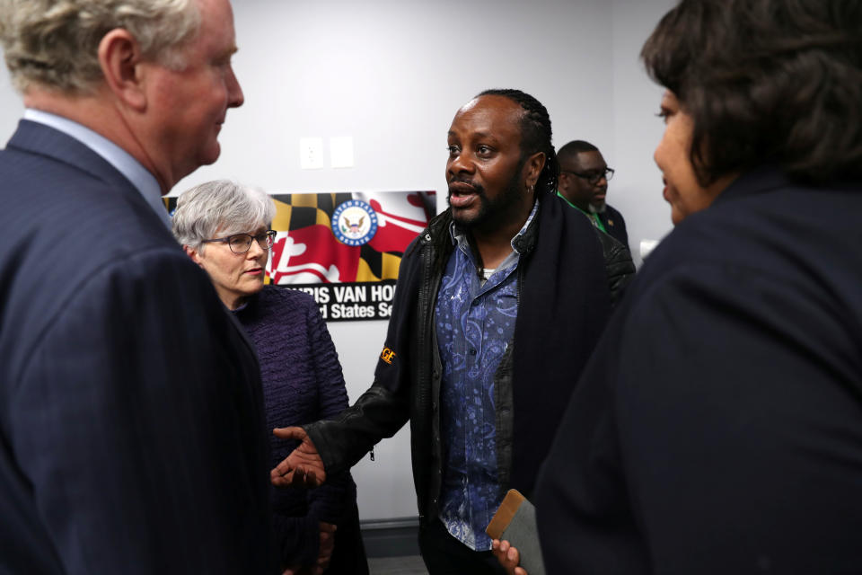 Federal employee Edward Hill talks with U.S. Senator Chris Van Hollen (D-MD) after they participated in a roundtable discussion on the partial U.S. federal government shutdown on January 7, 2019. (Photo: REUTERS/Jonathan Ernst)