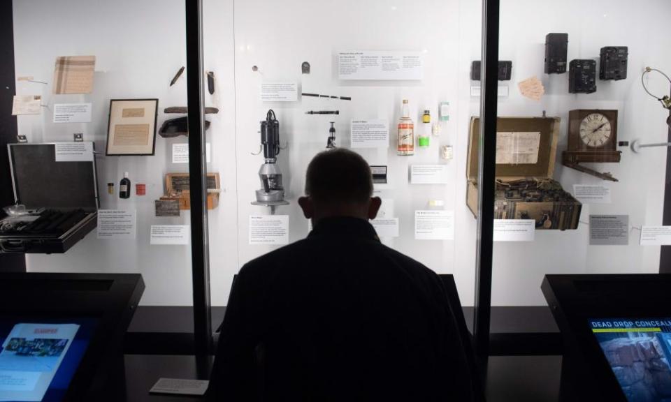 A visitor tours the International Spy Museum.