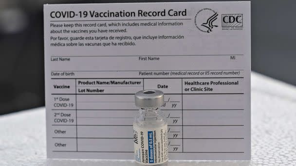 PHOTO: A COVID-19 J&J vaccine and a vaccination record card. (Pacific Press/LightRocket via Getty Images)