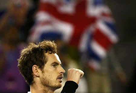 Britain's Andy Murray celebrates after winning his semi-final match against Canada's Milos Raonic at the Australian Open tennis tournament at Melbourne Park, Australia, January 29, 2016. REUTERS/Thomas Peter
