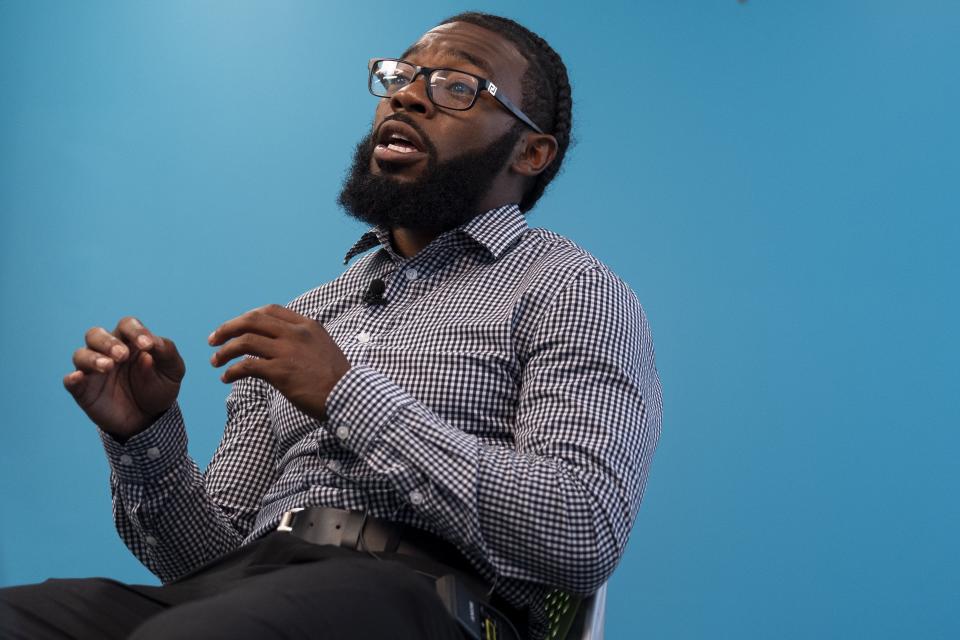 Shiloh Jordan, a Baltimore native whose cannabis conviction was pardoned by an executive order from Maryland Gov. Wes Moore on Monday, speaks to the Associated Press during an interview, Tuesday, June 18, 2024, in Baltimore. (AP Photo/Stephanie Scarbrough)