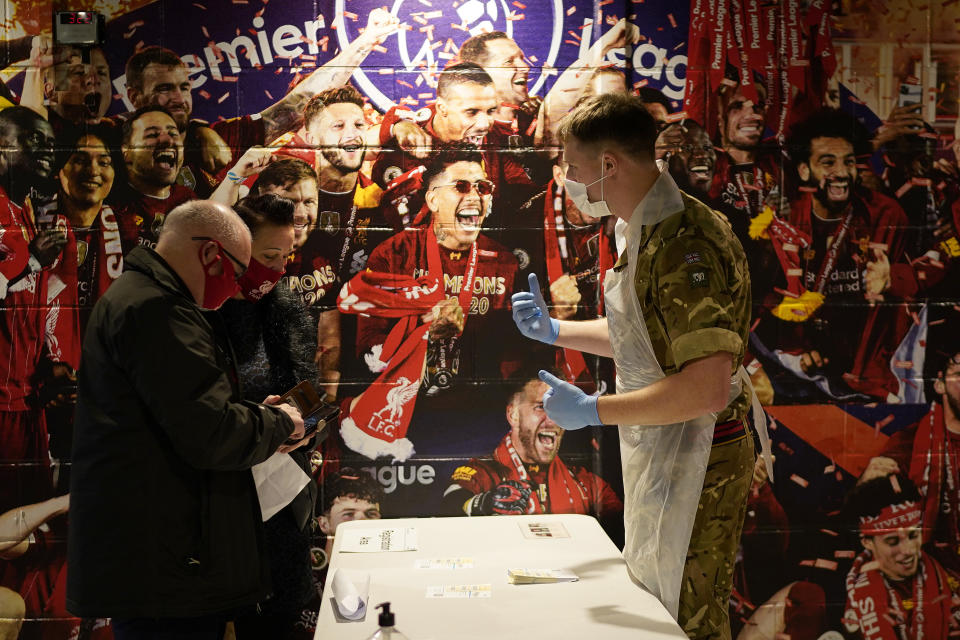 LIVERPOOL, ENGLAND - NOVEMBER 11: Gunners from the Royal Artillery operate a coronavirus disease (Covid-19) testing centre at Liverpool Football Club's Anfield stadium on November 11, 2020 in Liverpool, England. More than 23,000 people had been tested for covid-19 in the first three days of the city's mass testing trial. In that time, 154 people tested positive. All residents and workers in the city were offered the test. (Photo by Christopher Furlong/Getty Images)