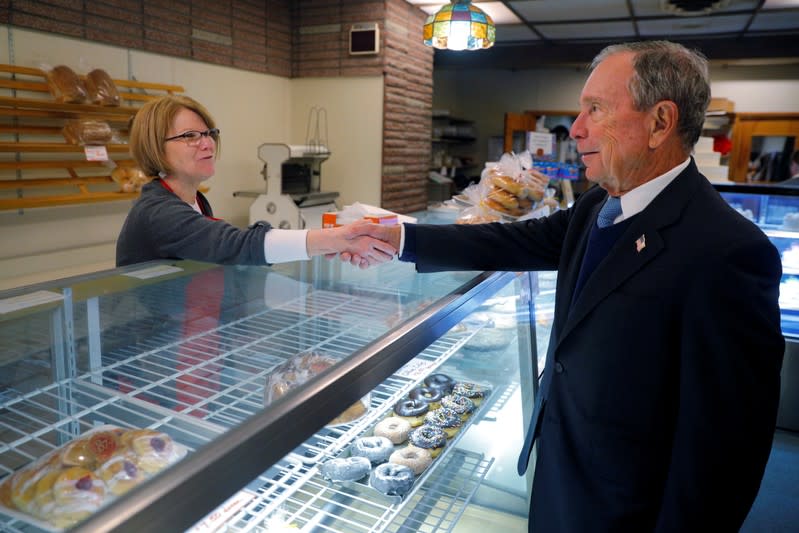 FILE PHOTO: Former New York City Mayor Bloomberg greets co-owner Susan O'Donnell at Harvey's Bakery and Coffee Shop in Dover