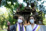 Former Secretary of State Clinton attends an unveiling of a bronze statue following the 100th anniversary of the ratification of the 19th amendment in Manhattan's Central Park