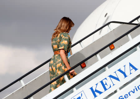 U.S. first lady Melania Trump boards an aircraft as she departs Nairobi, Kenya, October 6, 2018. REUTERS/Carlo Allegri