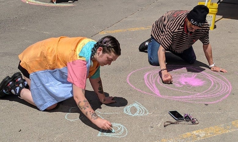 Chalk street artwork was one activity during the Aberdeen Area Pride Festival downtown Saturday and Sunday.