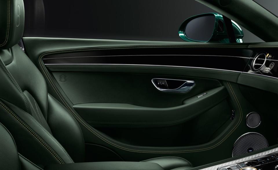 <p>The headrests and door panels receive embossed "B" logos in homage to the original 1930 Blower Bentley.</p>