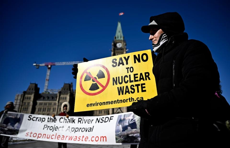 People participate in a rally against the Near Surface Disposal Facility (NSDF) project at the Canadian Nuclear Laboratories Chalk River site, on Parliament Hill in Ottawa, on Wednesday, Feb. 14, 2024.