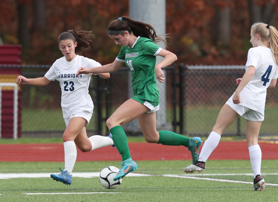 Irvington's Sofia Rosenblatt (19) moves the ball away from Lourdes' Frannie Seipp (23) during the girls soccer Class B state regional semifinals at Arlington High School in Lagrangeville Nov. 1, 2022. Irvington won the game 1-0 in overtime on a goal by Rosenblatt.