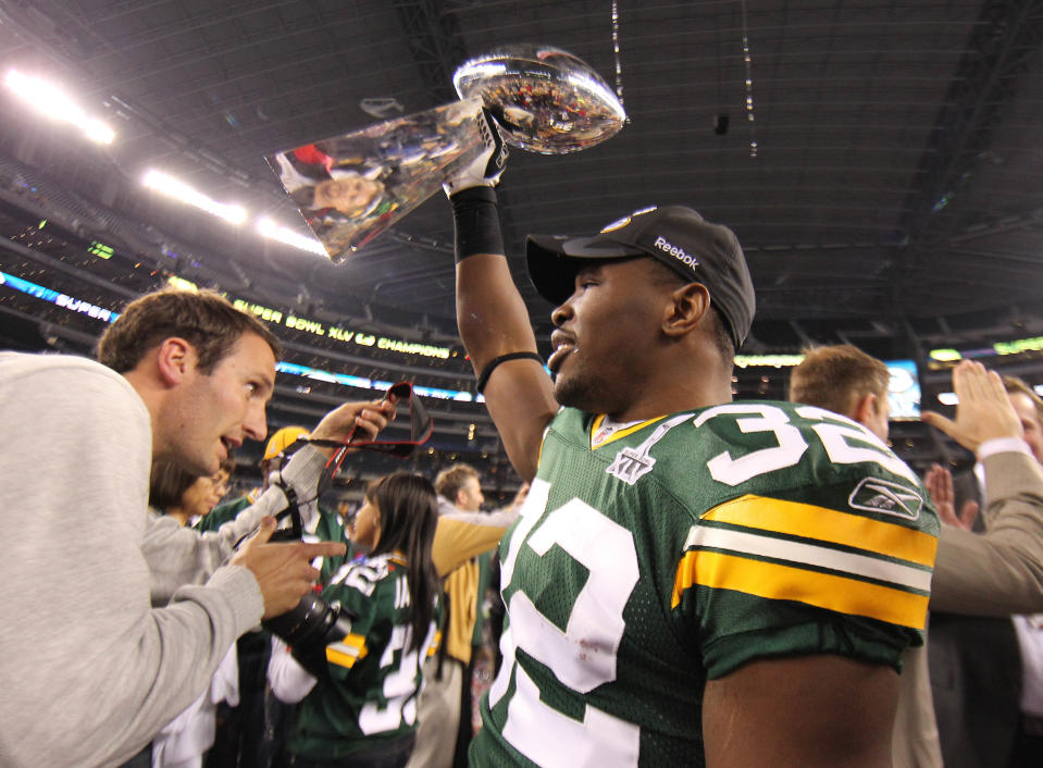 Feb 6, 2011; Arlington, TX, USA; Green Bay Packers running back Brandon Jackson (32) celebrates a victory with the Vince Lombardi trophy after defeating the <a class="link " href="https://sports.yahoo.com/nfl/teams/pittsburgh/" data-i13n="sec:content-canvas;subsec:anchor_text;elm:context_link" data-ylk="slk:Pittsburgh Steelers;sec:content-canvas;subsec:anchor_text;elm:context_link;itc:0">Pittsburgh Steelers</a> 31-25 in Super Bowl XLV at Cowboys Stadium. Mandatory Credit: Matthew Emmons-USA TODAY Sports