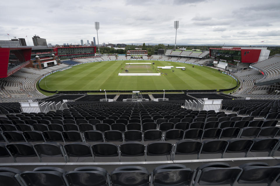 FILE - In this Tuesday, Sept. 3, 2019 file photo, a view of the stadium during a nets session before the 4th Ashes Test cricket match between England and Australia at Old Trafford cricket ground in Manchester, England. The Old Trafford cricket ground is spearheading plans in England to try to bring fans back into a sports venue during the coronavirus pandemic. Lancashire Cricket Club chief executive Daniel Gidney believes social distancing can be applied in their 26,000-seat ground to allow in at least 1,000 fans. (AP Photo/Jon Super, File)