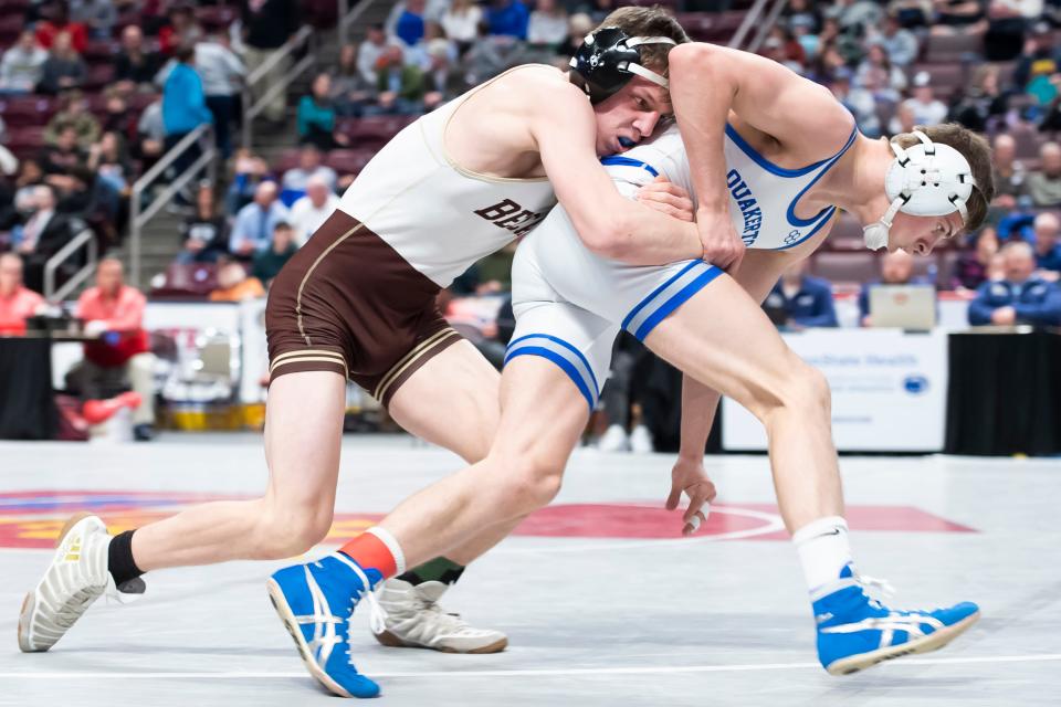 Quakertown's Collin Gaj, right, tries to escape Bethlehem Catholic's Kollin Rath during the 132-pound third-place bout at the PIAA Class 3A Wrestling Championships at the Giant Center on Saturday, March 12, 2022, in Derry Township. Rath won in sudden victory by decision, 3-1.