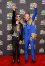 Macklemore and collaborator Ryan Lewis looked triumphant after a chart-topping year.