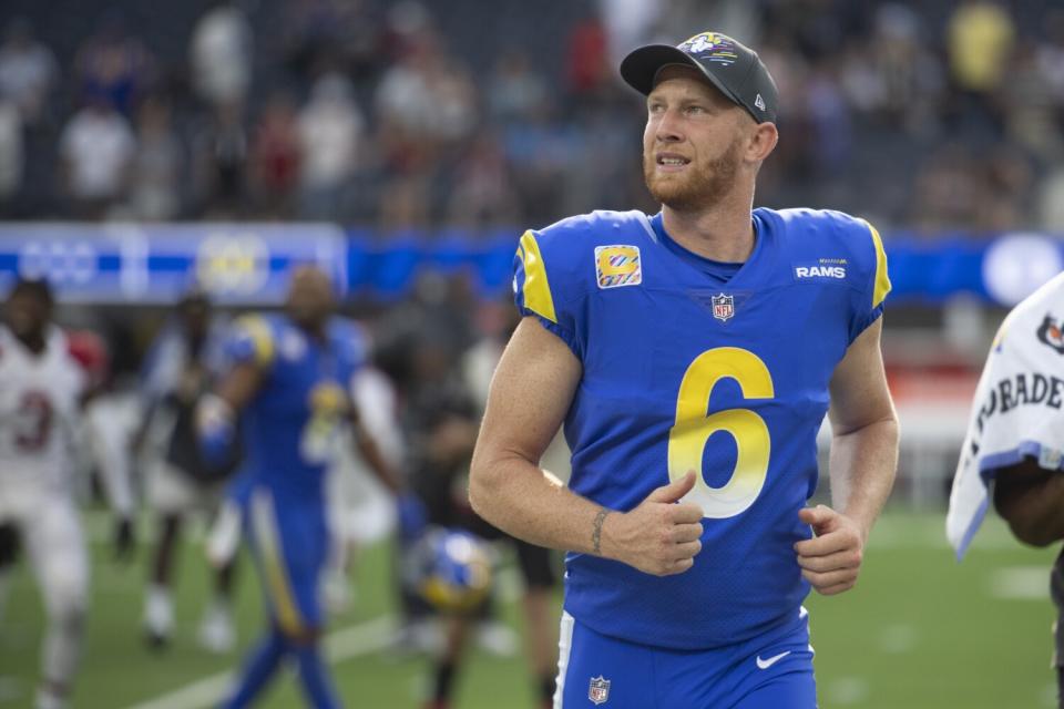 Rams punter Johnny Hekker jogs back to the locker room after a game in October.