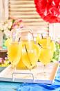 <p>This summery cocktail is made with coconut rum, coconut water and vanilla pods. </p><p><strong>Recipe: <a href="https://www.goodhousekeeping.com/uk/food/recipes/a43440124/coconut-rum-punch-recipe/" rel="nofollow noopener" target="_blank" data-ylk="slk:Coconut rum punch;elm:context_link;itc:0;sec:content-canvas" class="link ">Coconut rum punch</a></strong></p>