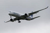 An Airbus A350-1000 lands during its maiden flight event in Colomiers near Toulouse, Southwestern France, November 24, 2016. REUTERS/Regis Duvignau