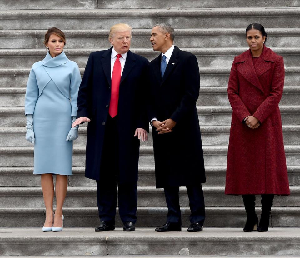 First Lady Melania Trump, President Donald Trump former President Barack Obama and Michelle on the East front steps of the US Capitol after inauguration ceremonies on January 20, 2017 in Washington, DC (AFP via Getty Images)