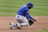 New York Mets third baseman Jonathan Villar stops a grounder by St. Louis Cardinals' Justin Williams before throwing Williams out at first during the second inning of a baseball game Thursday, May 6, 2021, in St. Louis. (AP Photo/Jeff Roberson)