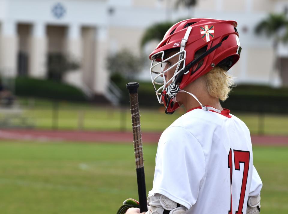 St. Andrew's Mason LeLack looks on from the sideline after helping his team to a big first-half lead in the Scots' district semifinals game against Calvary Christian on April 11, 2024.