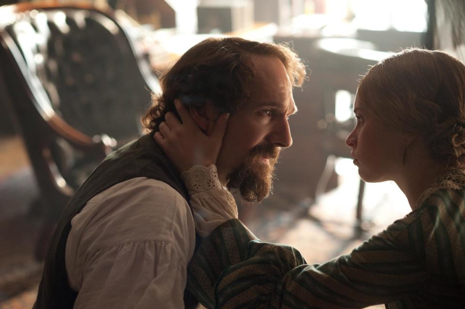 This image released by Sony Pictures Classics shows Ralph Fiennes, left, as Charles Dickens and Felicity Jones, as Nelly Ternan, in a scene from "The Invisible Woman." (AP Photo/Sony Pictures Classics, David Appleby)