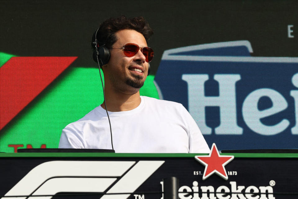 Afrojack DJing and smiling