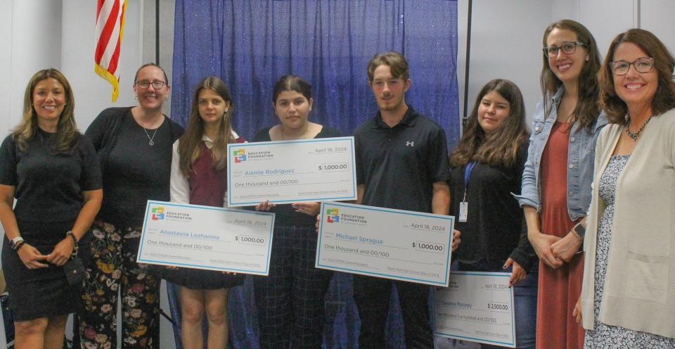 North Port High School STRIVE Award winners Anastasiia Lezhanina, Alainie Rodriguez, Michael Sprague, and Savanna Maroney with assistant principal Linda Copeland, counselors Ashley Jennings and Jennica Thomas, and college/career coordinator Becky Halbert.